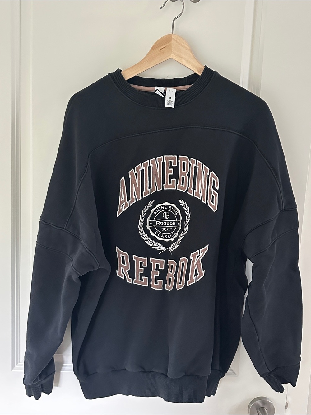 Annie bing and Reebok Women’s Black Crewneck Sweatshirt with Contrast Logo
